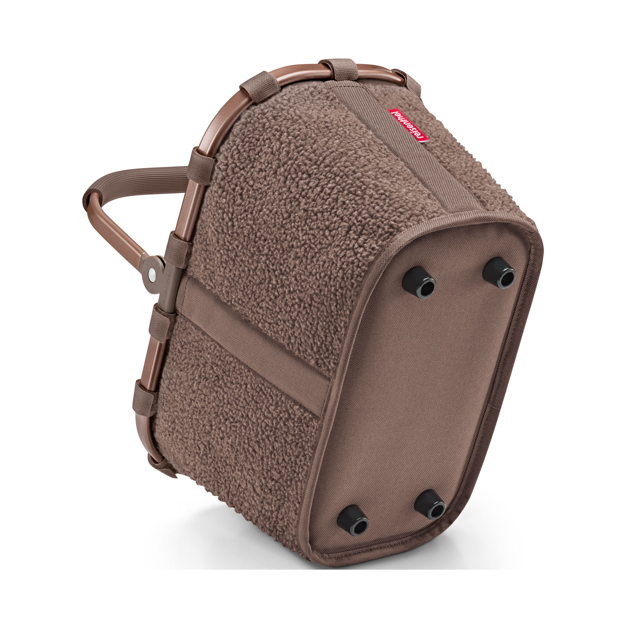 Kleiner Einkaufskorb von Reisenthel, Modell Carrybag XS, in Schokoladenbraun aus Teddyfleece, schräg von unten mit sichtbaren Standfüßen