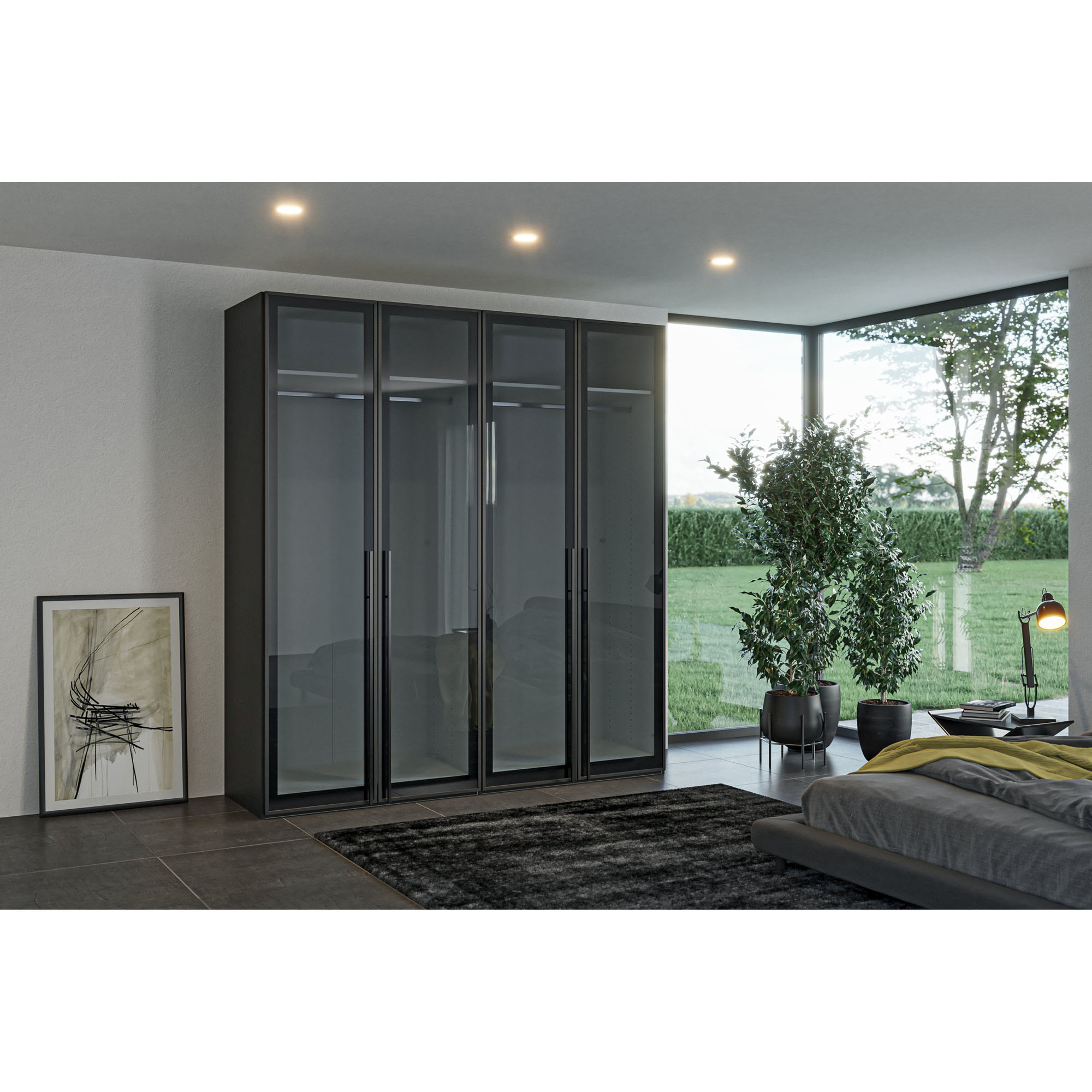 Drehtürenschrank mit Glasfronten in einem modern eingerichteten Schlafzimmer