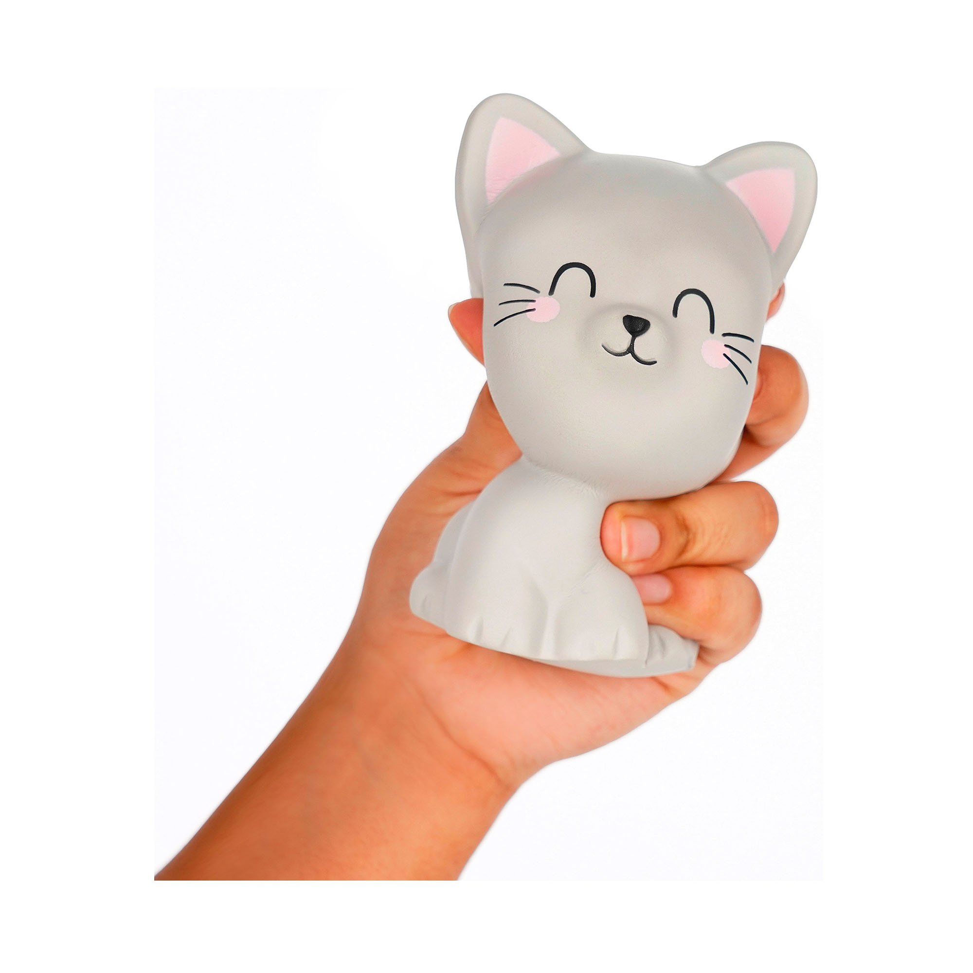 Graue Antistress-Figur in Katzenform, in einer Hand gehalten und leicht zusammengedrückt gezeigt.