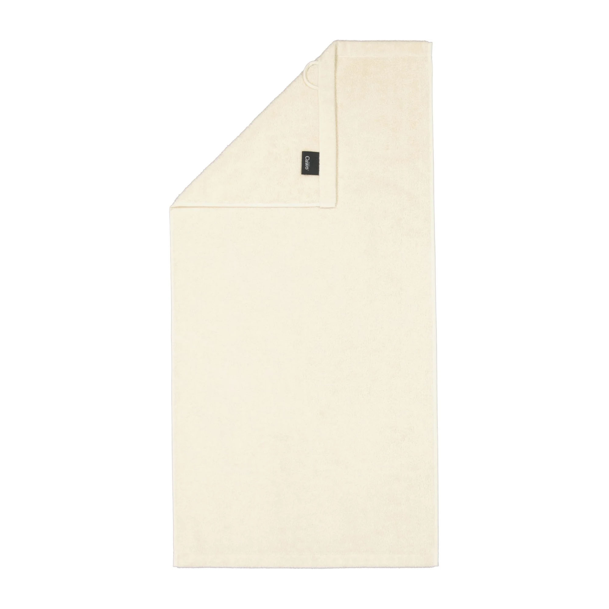 Handtuch in der Farbe Natur mit umgeschlagener Ecke; Rückseite, Saum und kleines Textiletikett sind auf weißem Hintergrund sichtbar.