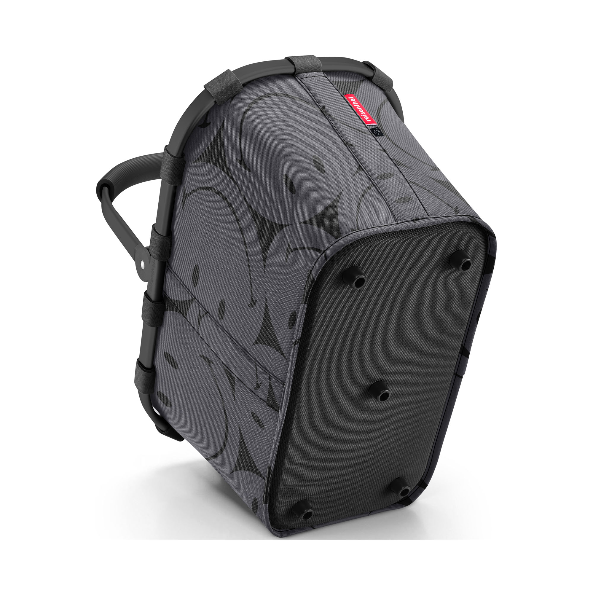 Einkaufskorb von Reisenthel, Modell Carrybag, in Grau mit großflächigem Smiley-Muster, schräg von unten mit vier schwarzen Standfüßen.