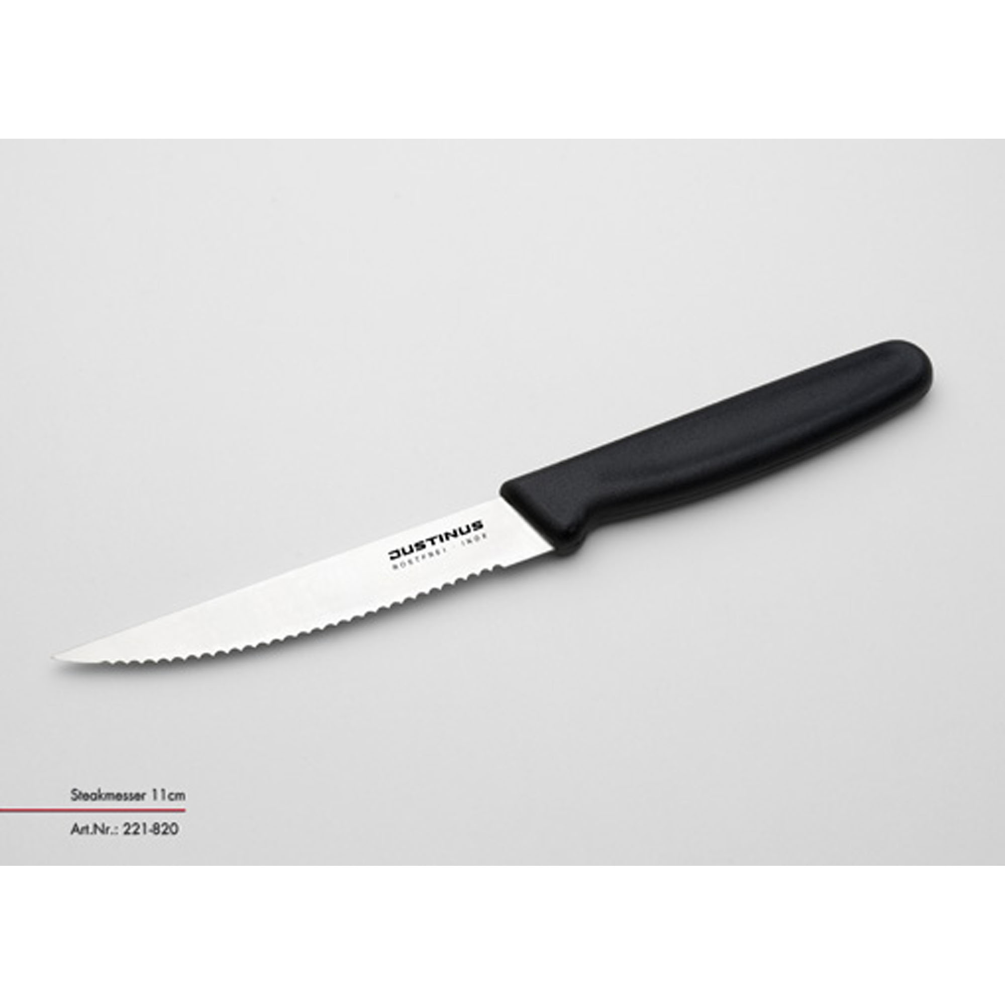 Steakmesser 11 cm FineCut: FineCut Steakmesser mit Wellenschliff und schwarzem Griff auf grauem Hintergrund.