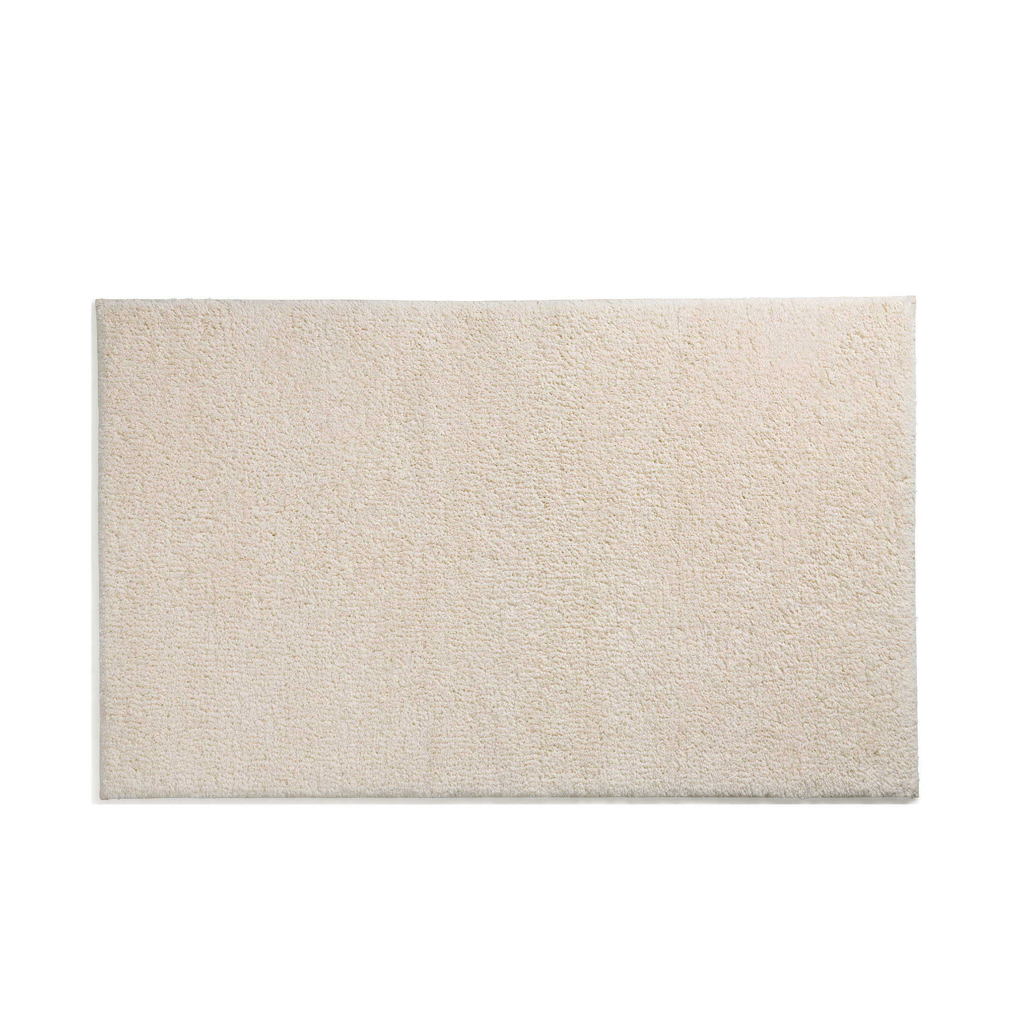 Sandbeige Badematte Maja in rechteckiger Form mit dichter, fein strukturierter Oberfläche.