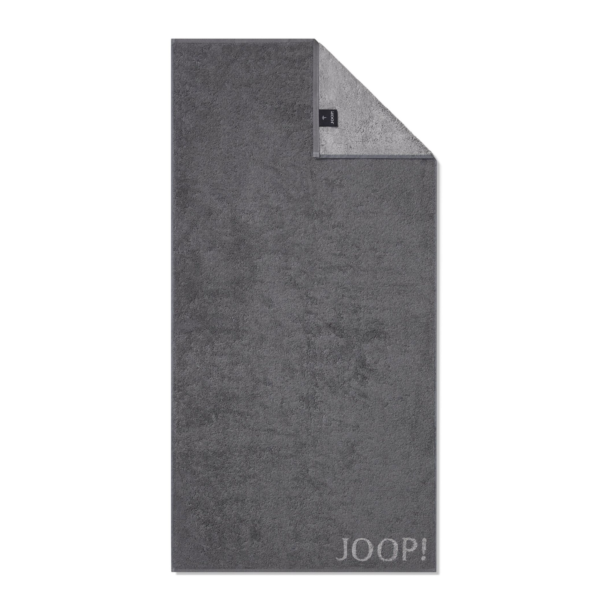 Anthrazitfarbener JOOP! Doubleface Handtuch, 50 × 100 cm, flach dargestellt mit umgeschlagener Ecke, kontrastierender Rückseite und JOOP!-Schriftzug am unteren Rand.