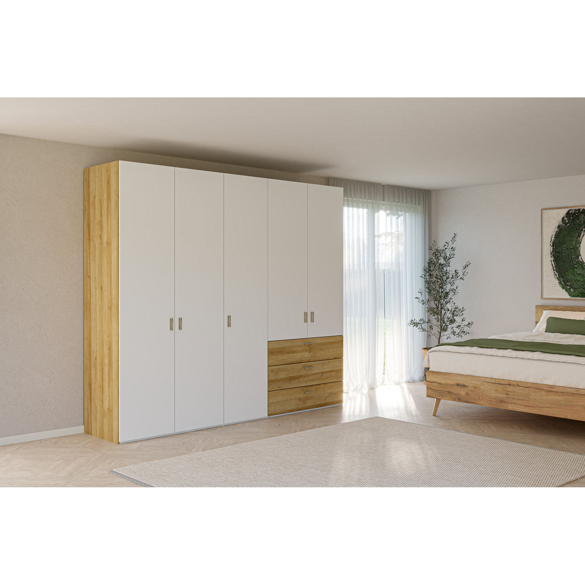 Kleiderschrank mit weißen Türen und Schubladen in Holzoptik in einem Schlafzimmer