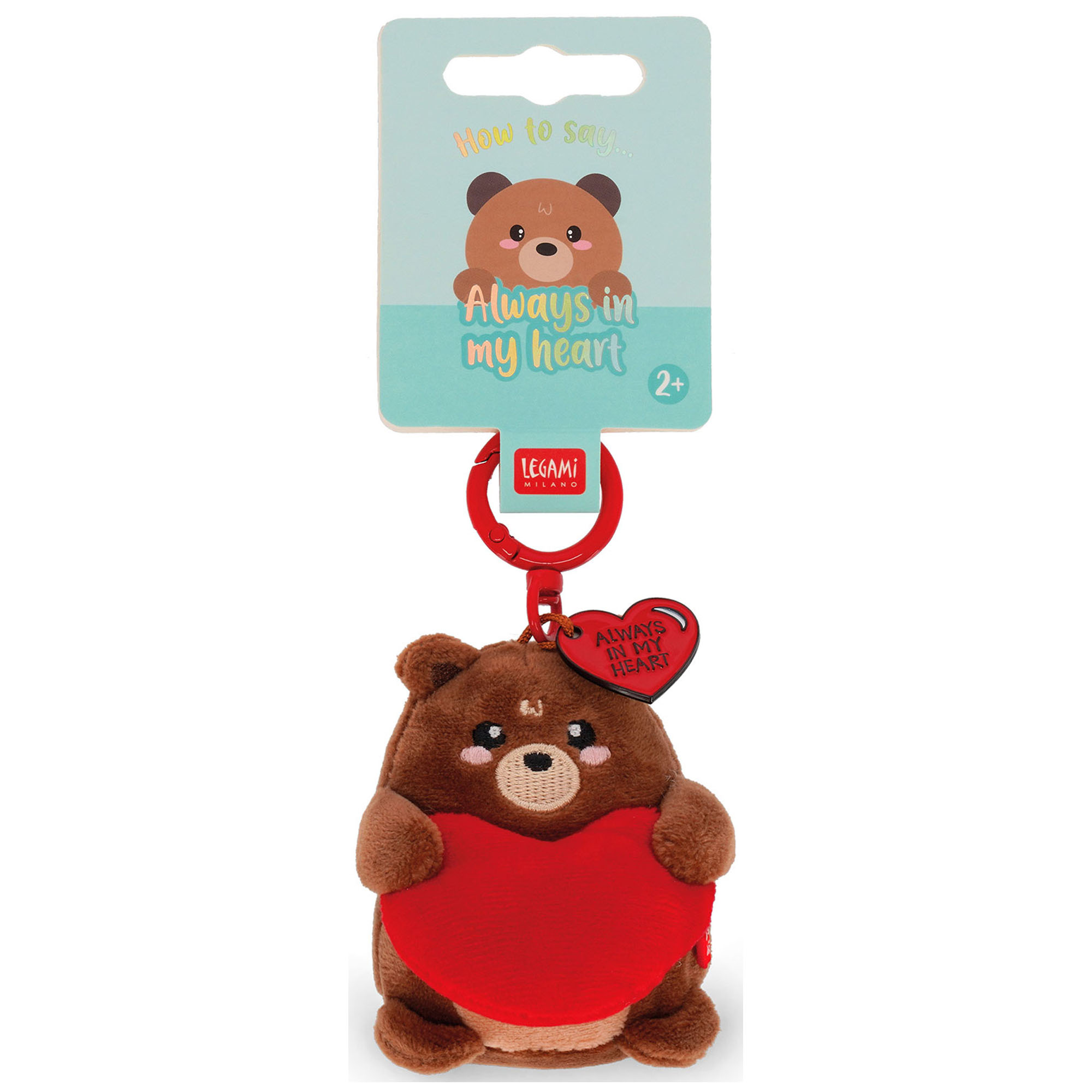 Brauner Teddybär-Plüsch-Schlüsselanhänger mit rotem Herz, an der Vorderseite der Kartonaufhängung gezeigt.