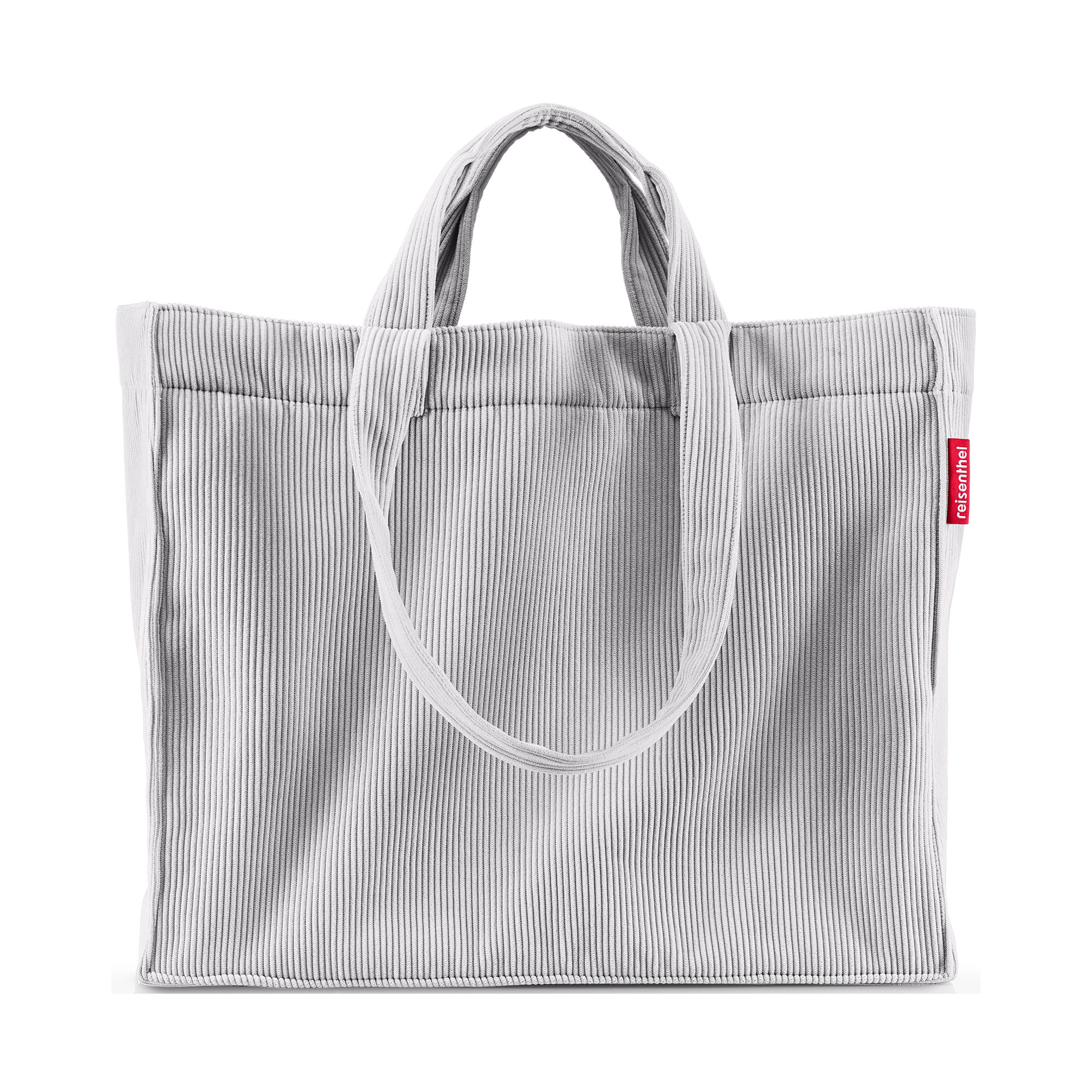 Große graue Reisenthel Shopper Tasche aus Cord mit langen Tragegriffen und schlichtem modernem Design auf hellem Hintergrund