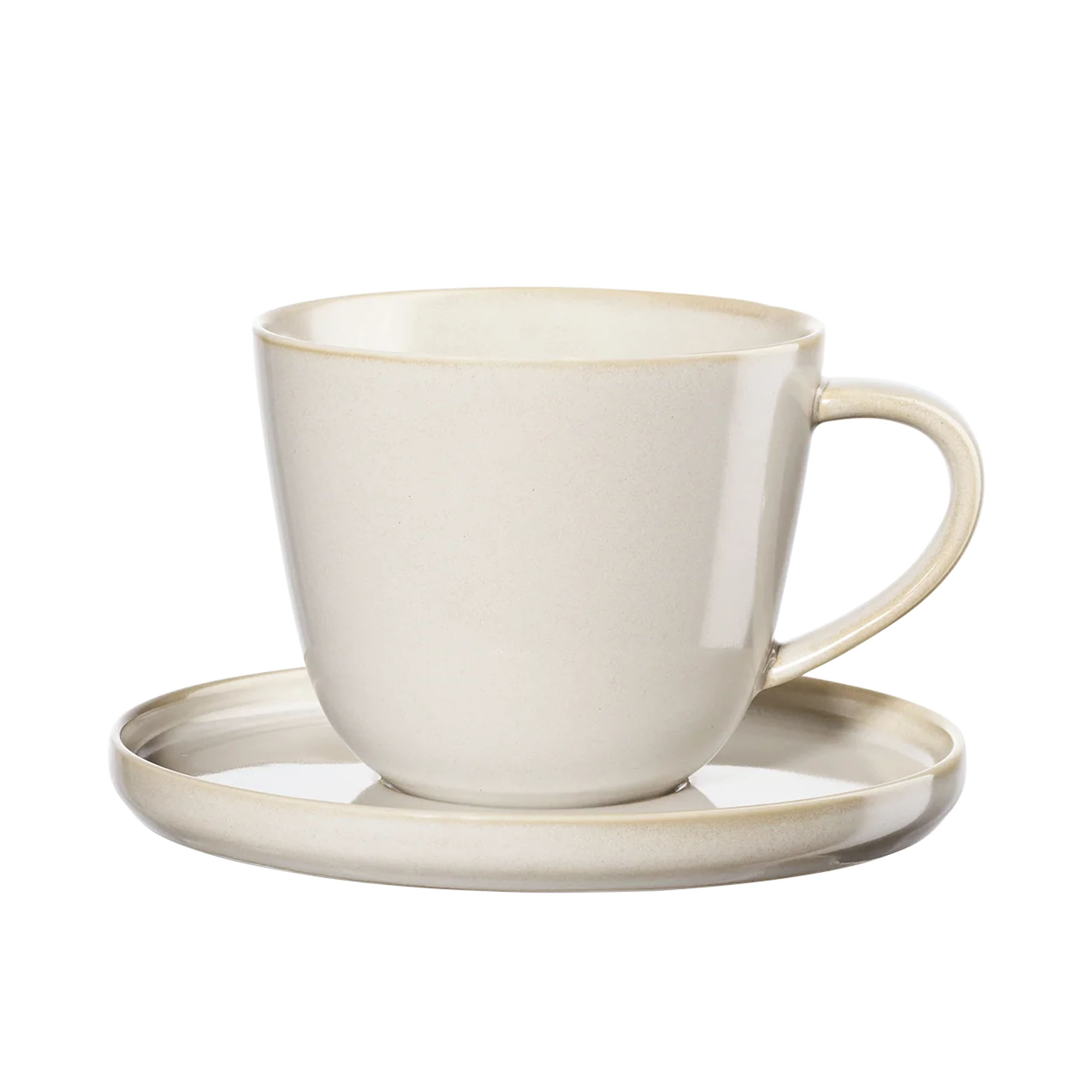 Kaffeetasse mit Unterteller der Serie Coppa, Farbe Nude, freigestellt auf hellem Hintergrund.