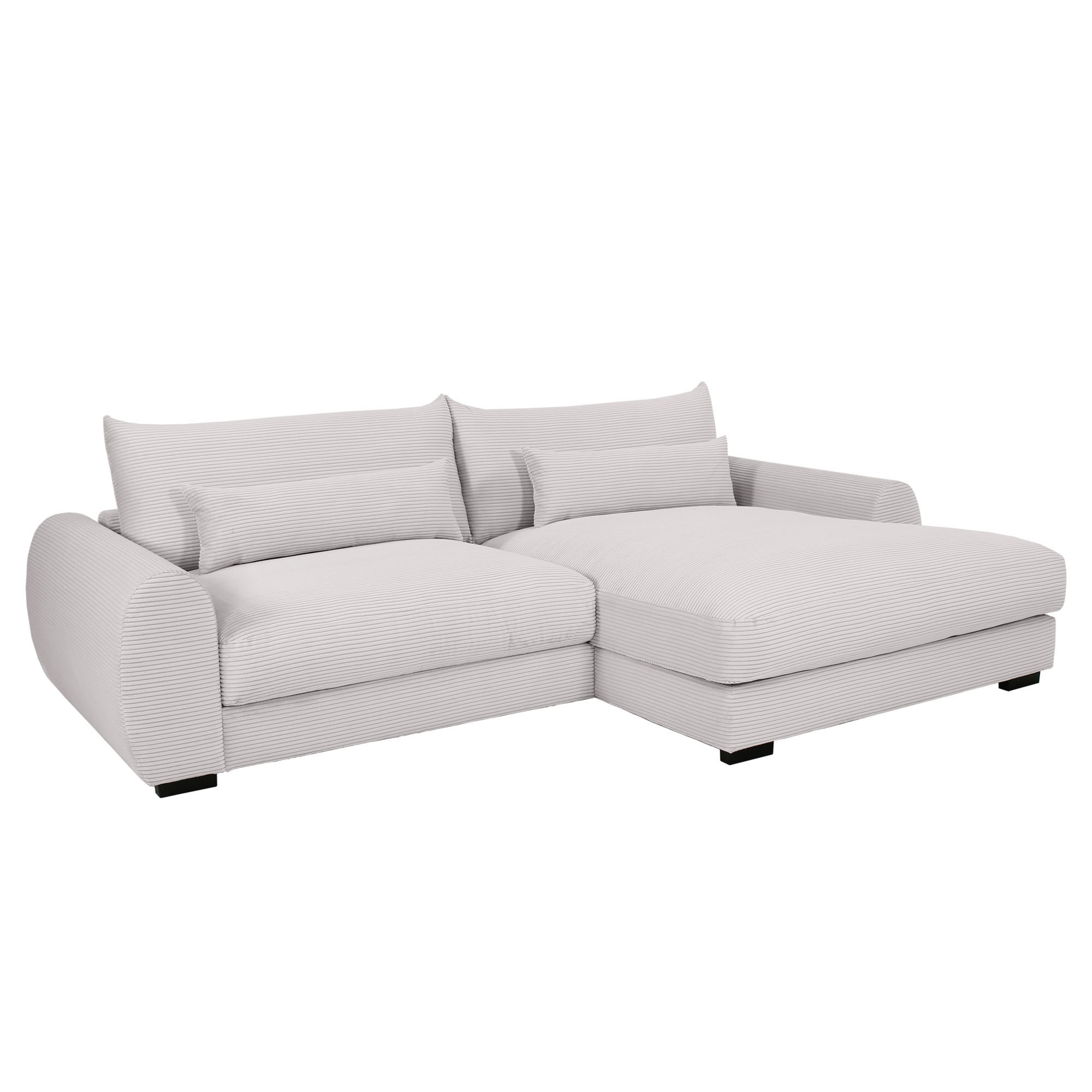 Schrägansicht des weißen Cordsofas mit breiter Ottomane rechts, gepolsterten Sitzflächen, losen Rückenkissen und Kunststofffüßen in Wenge Schwarz