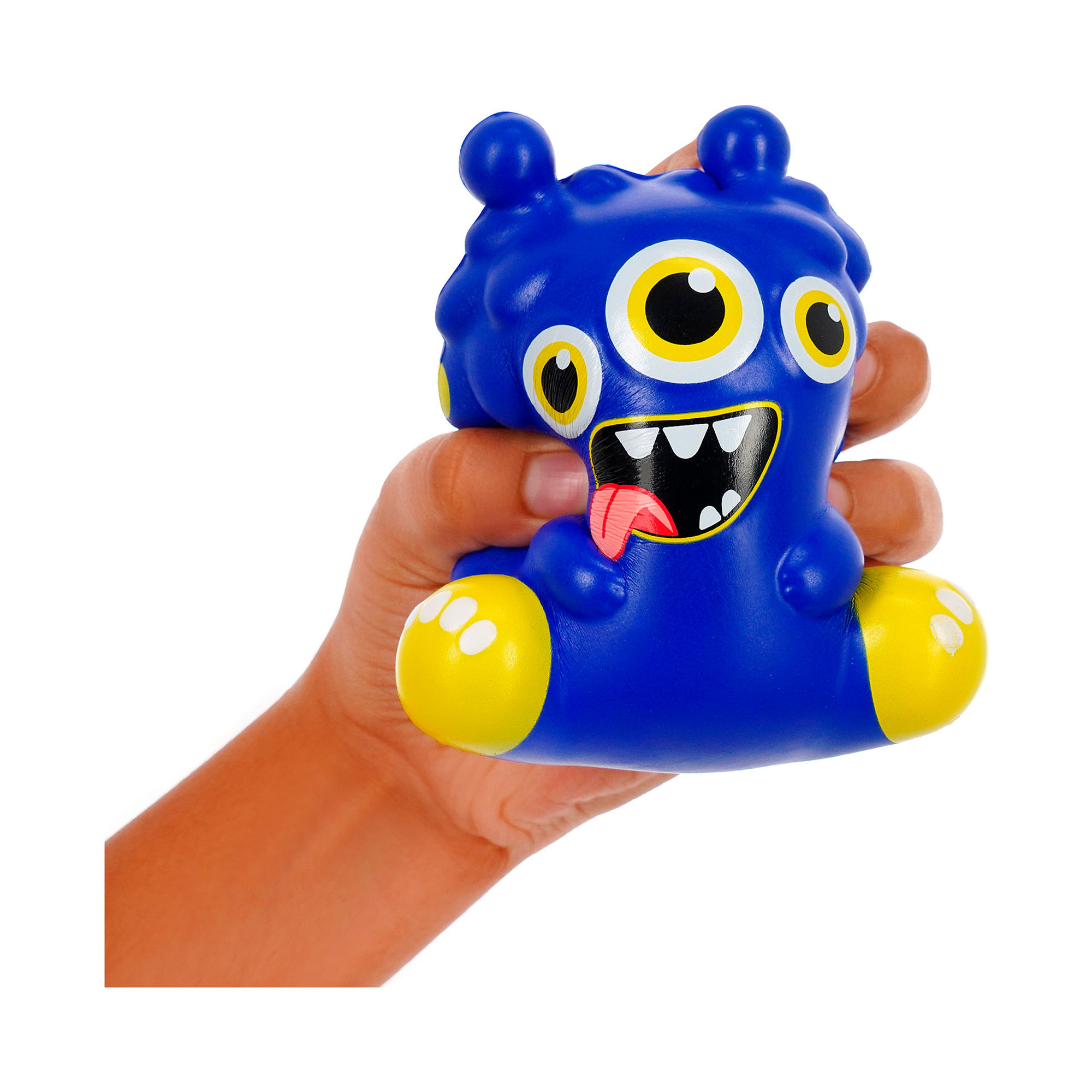 Blaue Antistress-Figur im Monster-Design, in einer Hand gehalten und leicht zusammengedrückt gezeigt.