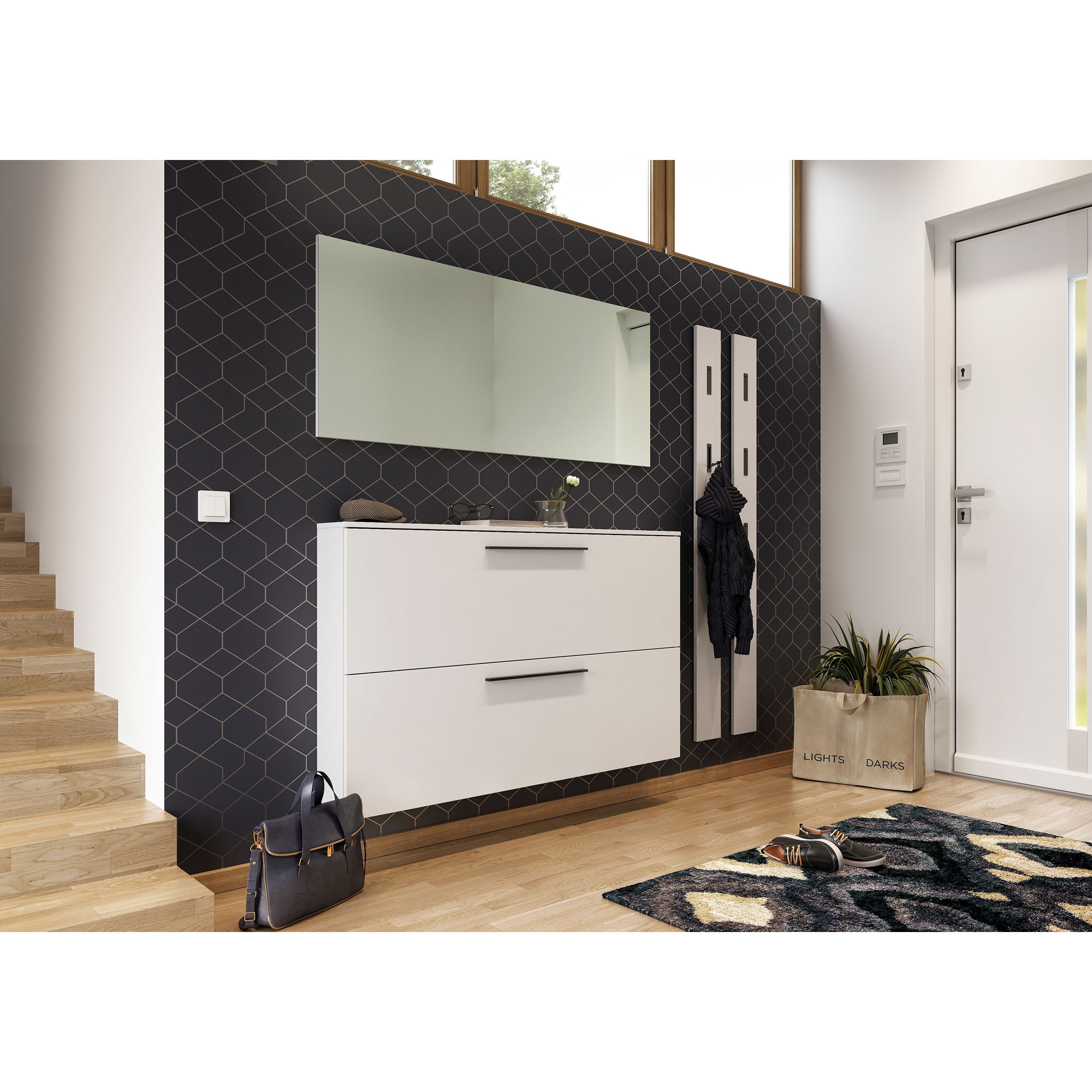 Schuhschrank mit zwei Klappen in Weiß in einer eingerichteten Diele mit Spiegel und Garderobenpaneelen