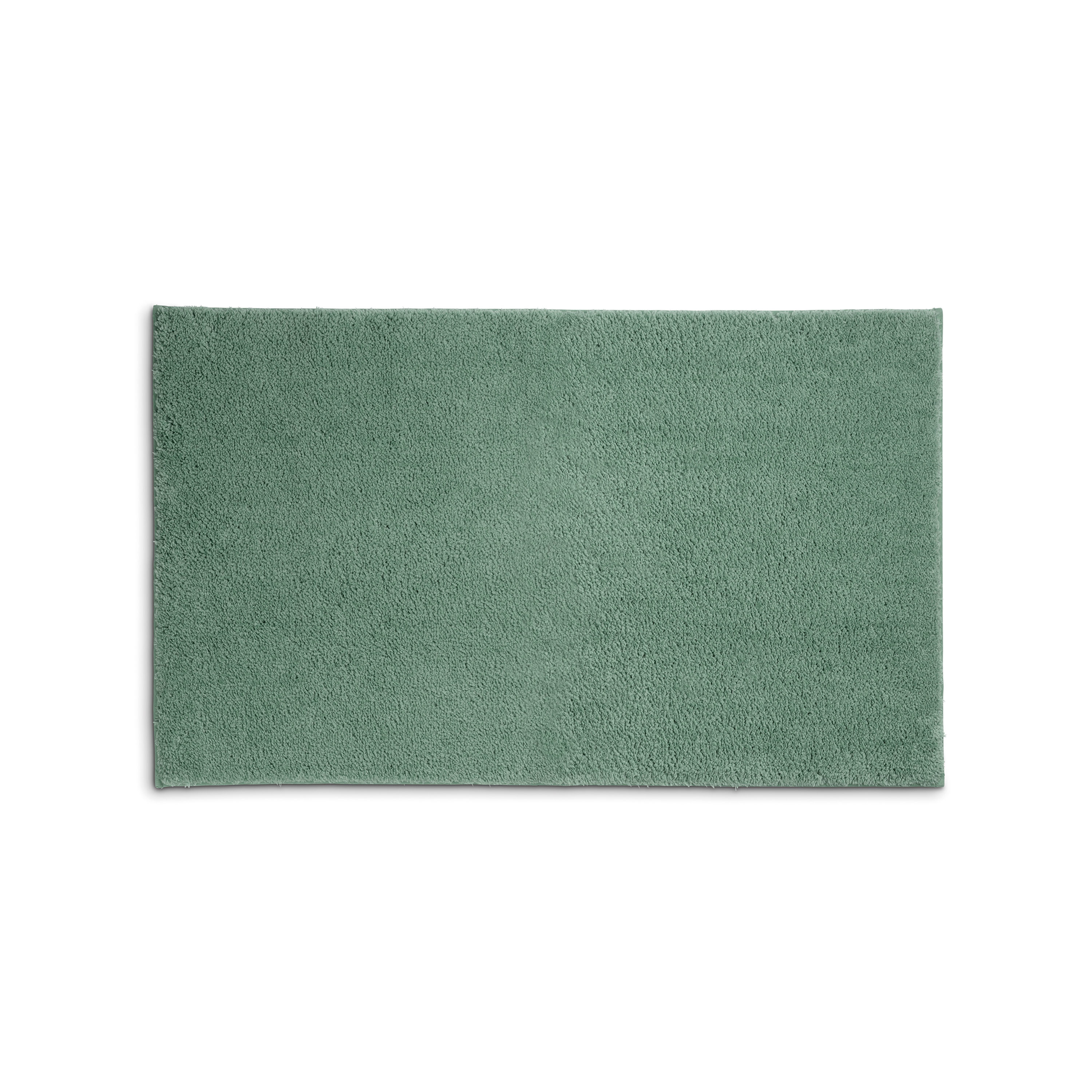 Jadegrüne Badematte Maja mit rechteckiger Form und dichtem, leicht meliertem Flor.