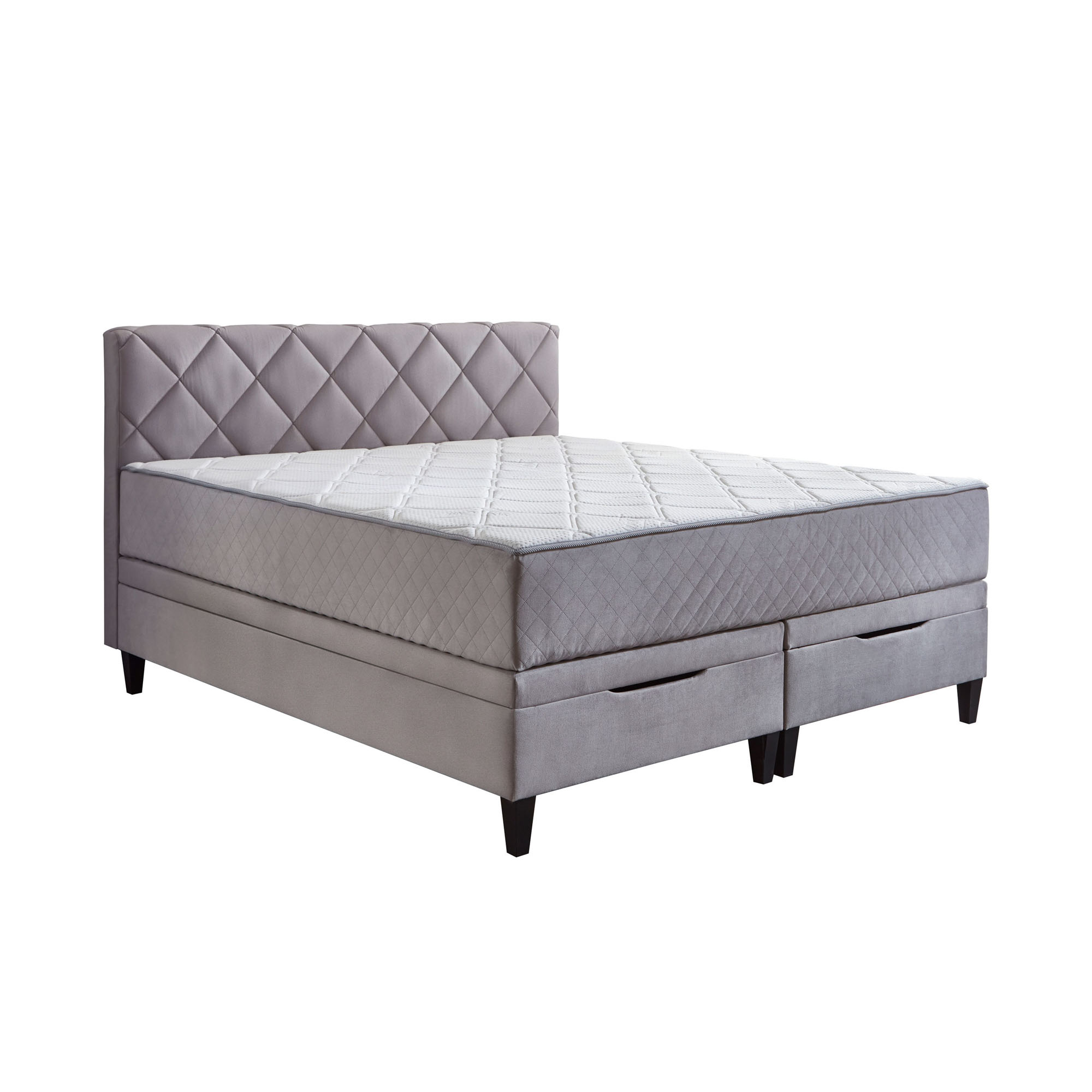 Boxspringbett mit gepolstertem Kopfteil und fest vernähtem Matratzentopper in Detailansicht