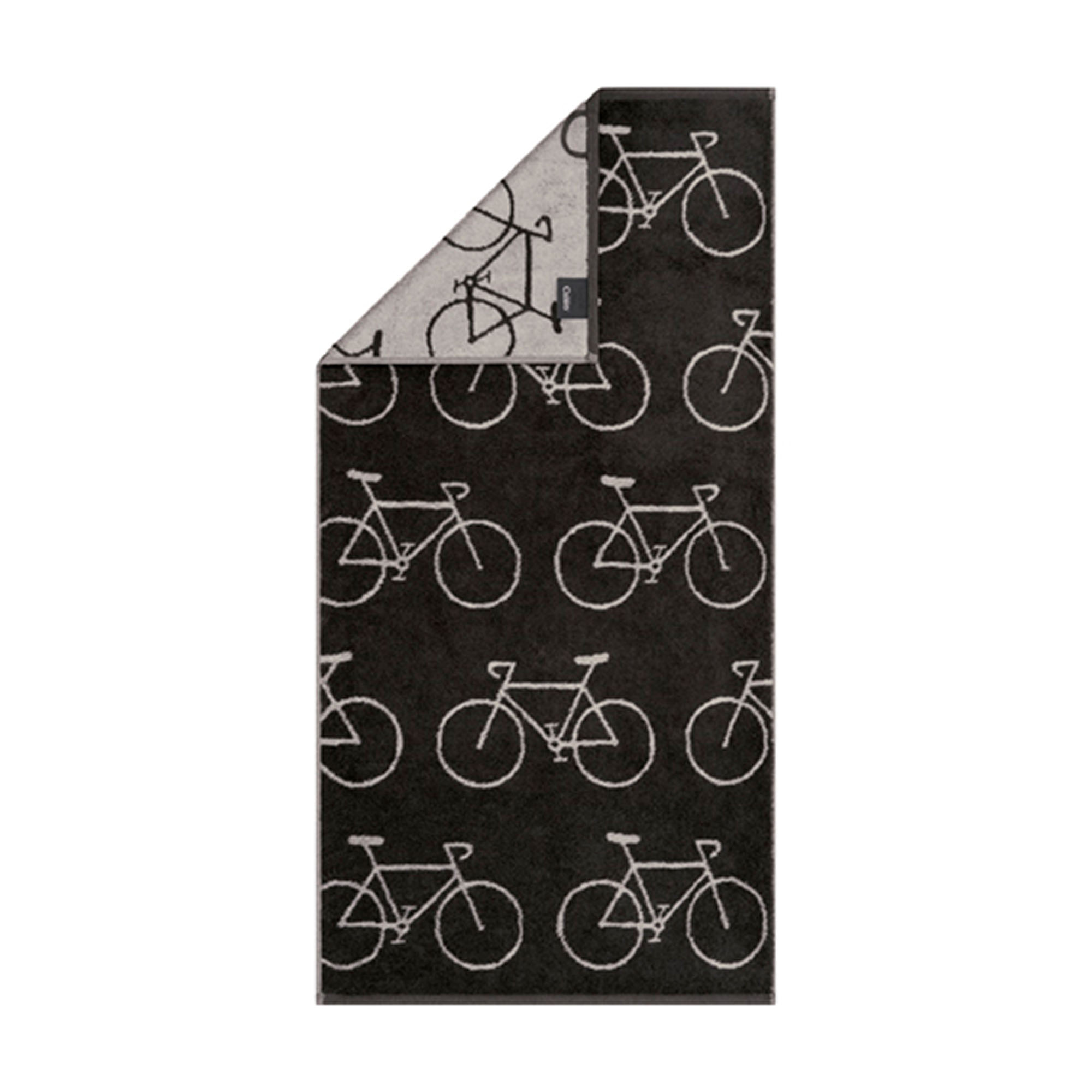 Handtuch Velo in Basalt mit wiederholten hellen Fahrradzeichnungen; eine obere Ecke zeigt die Rückseite.