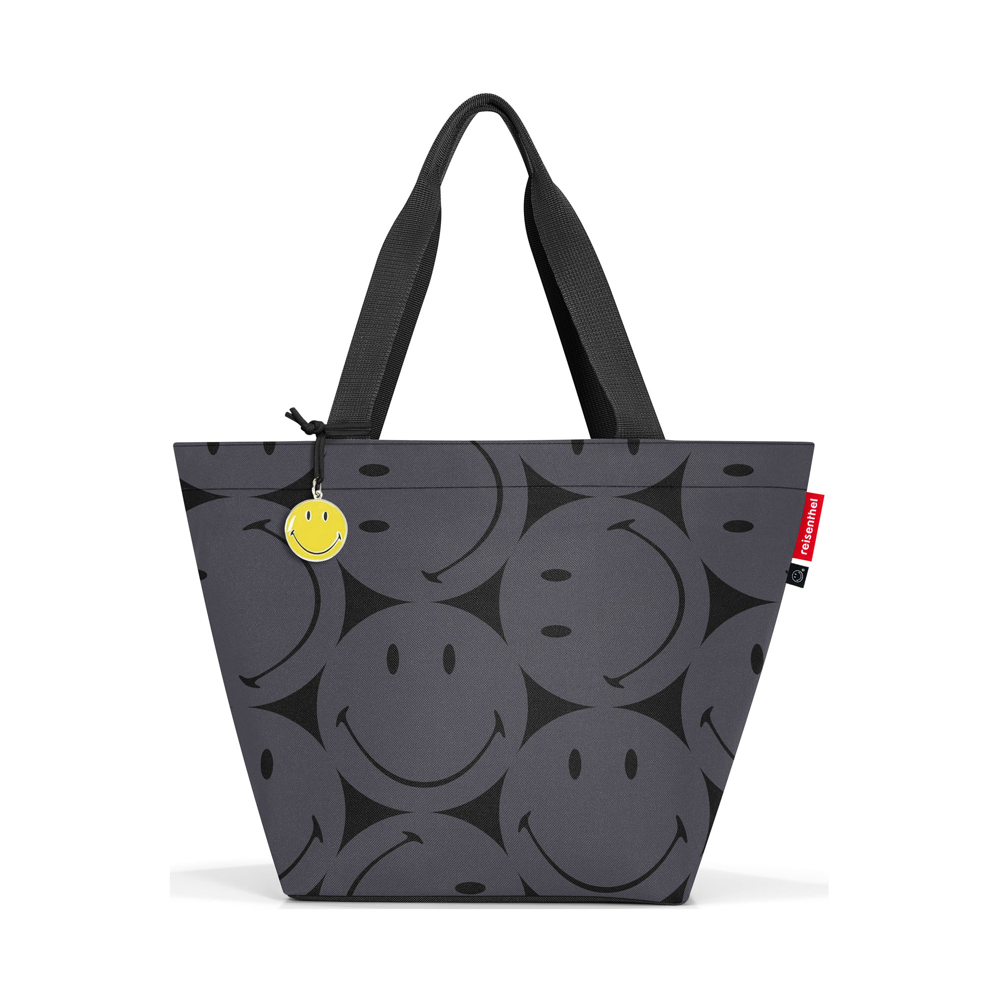 Shopper von Reisenthel, Modell Shopper M, in Grau mit großflächigem Smiley-Muster, von hinten mit zwei langen Tragegriffen und Smiley-Anhänger.