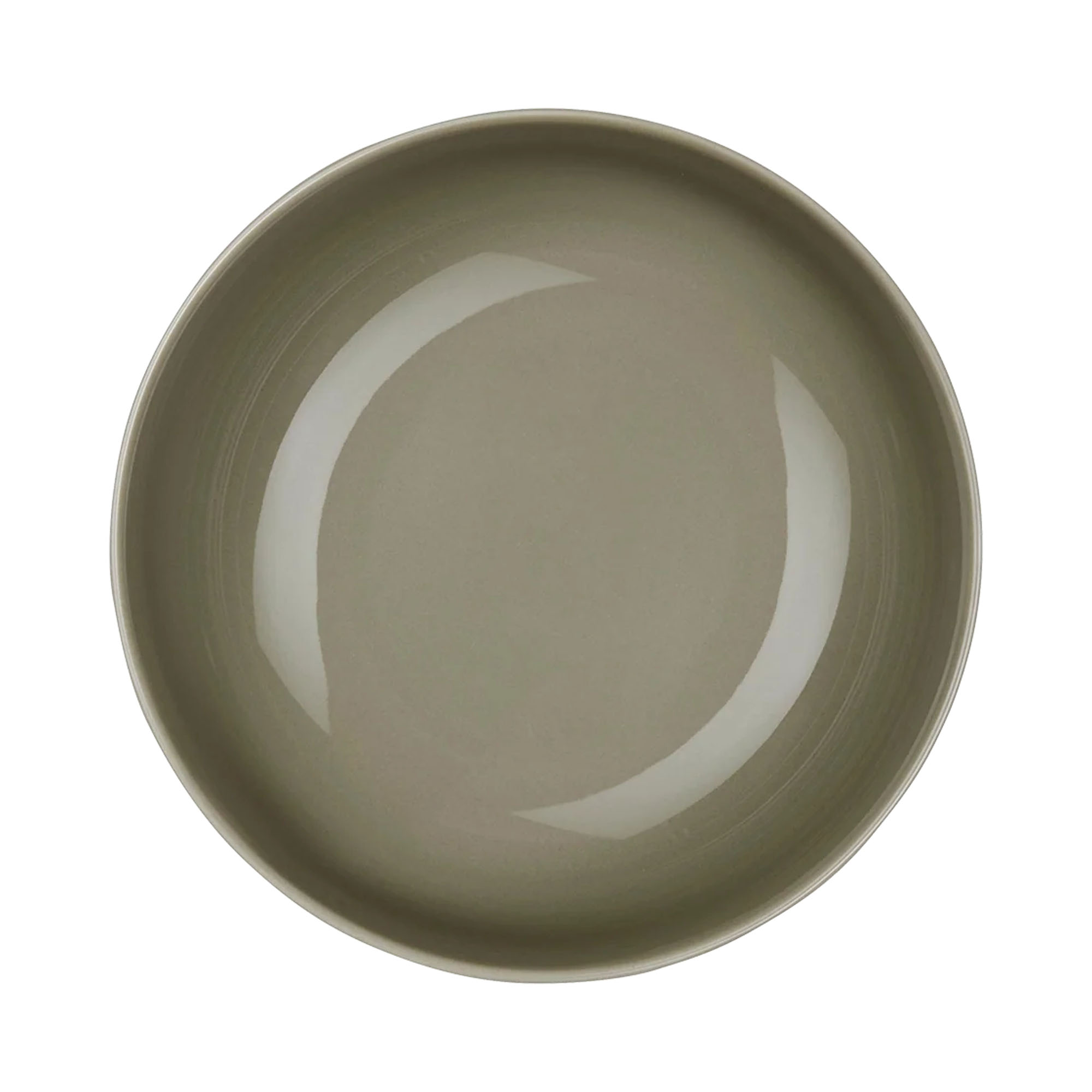 Arrangierte Szene: Buddha Bowl der Serie Coppa, Farbe Grün zusammen mit weiterem Geschirr auf einer gedeckten Fläche.