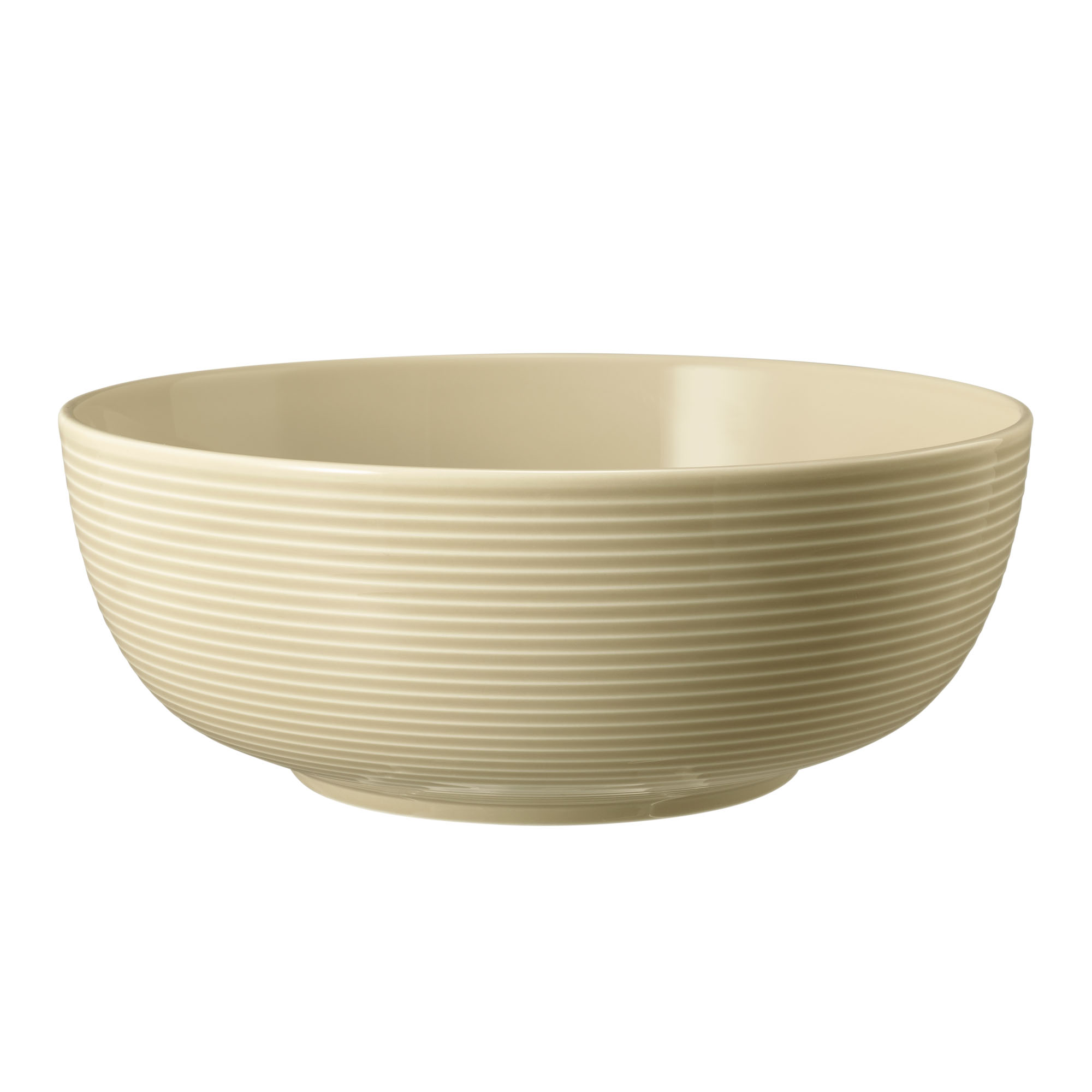 Schale in Sandbeige; rund und tief mit waagerechter Rillenstruktur. Ansicht: Seitenansicht.