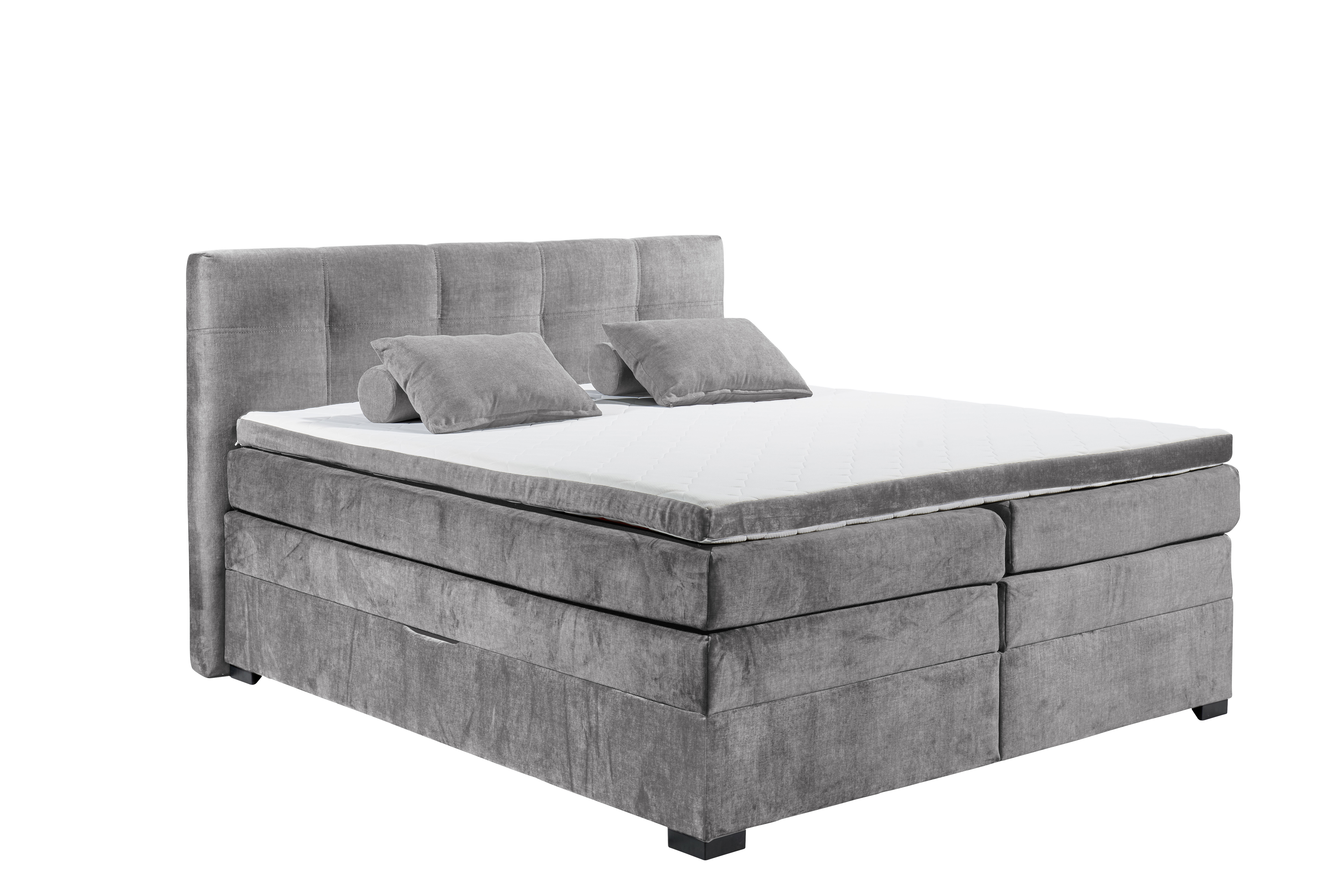 Boxspringbett „Vogue 15 grey“ mit Tonnentaschenfederkern-Matratze, Bettkasten und Kunststofffüßen, Liegefläche 180x200 cm, schräg fotografiert, dekoriert mit Kissen