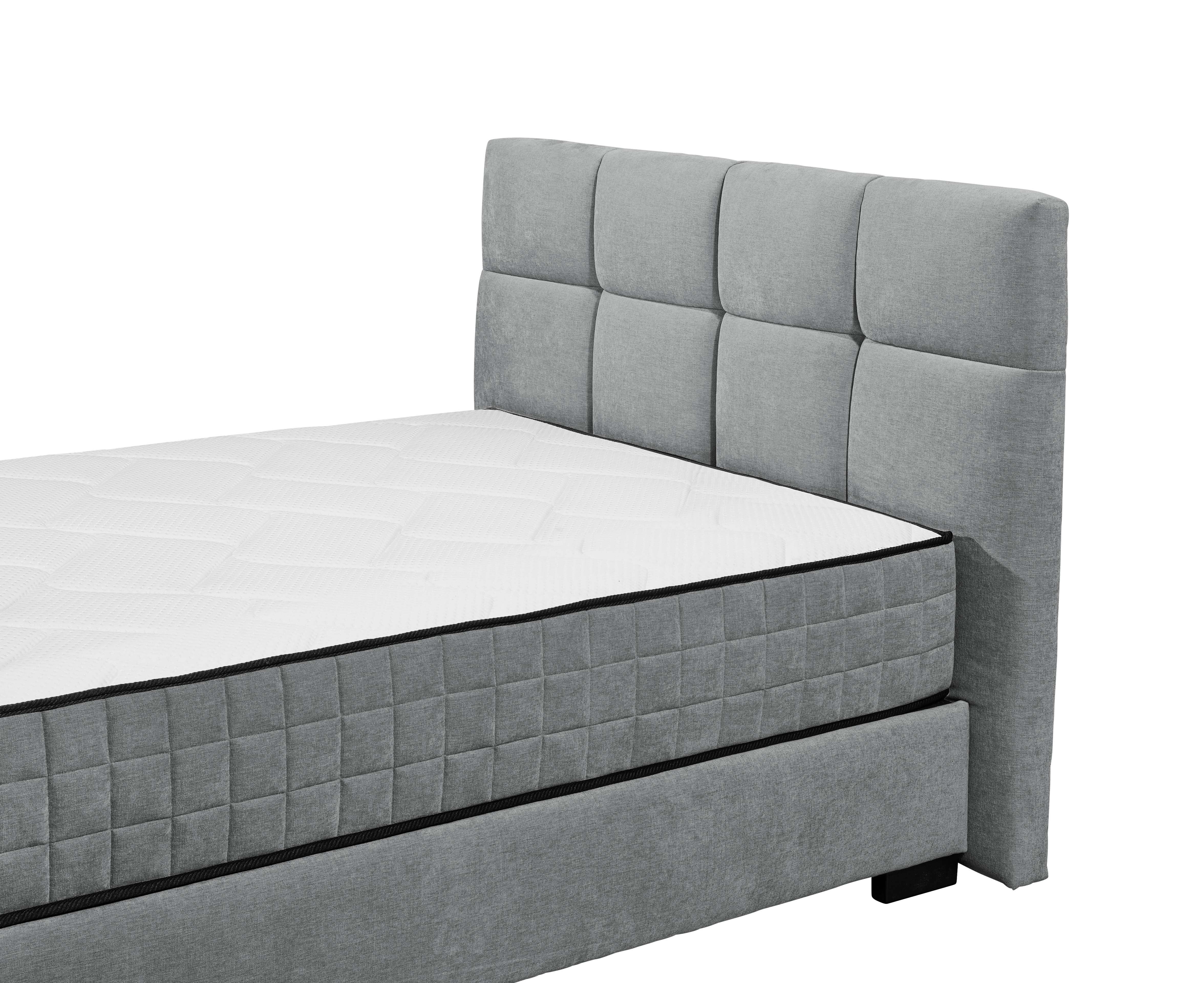 Boxspringbett „Wind 89 anthrazit“ aus schräger Perspektive nahe am Kopfteil aufgenommen, anthrazitfarbener Stoffbezug, Details von Matratze und Kopfteil sichtbar