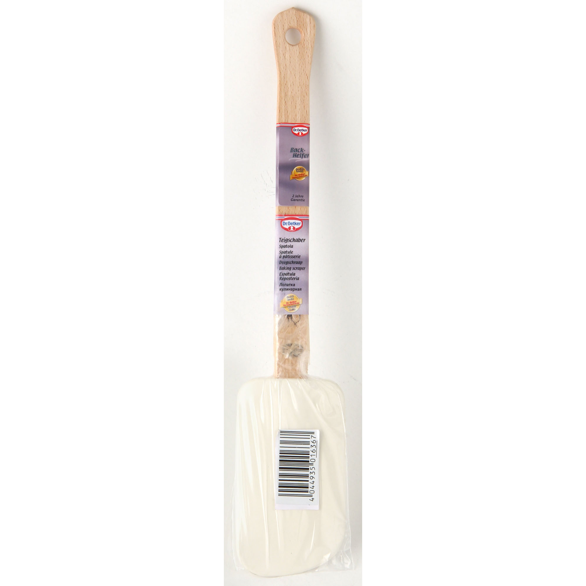 Verpackter Teigschaber von Dr Oetker mit Holzgriff und weißem Silikonkopf