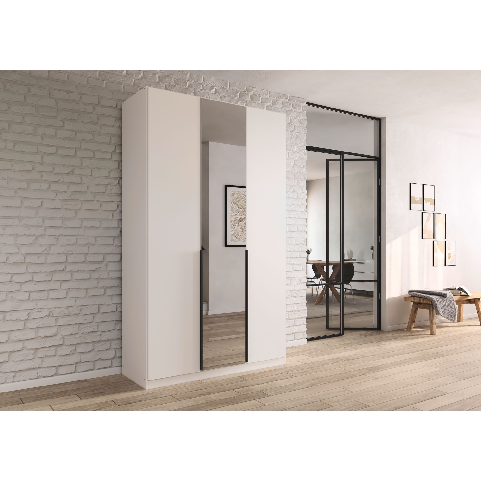 Weißer Kleiderschrank mit Spiegeltür in einem hellen Raum mit Backsteinwand und moderner Einrichtung