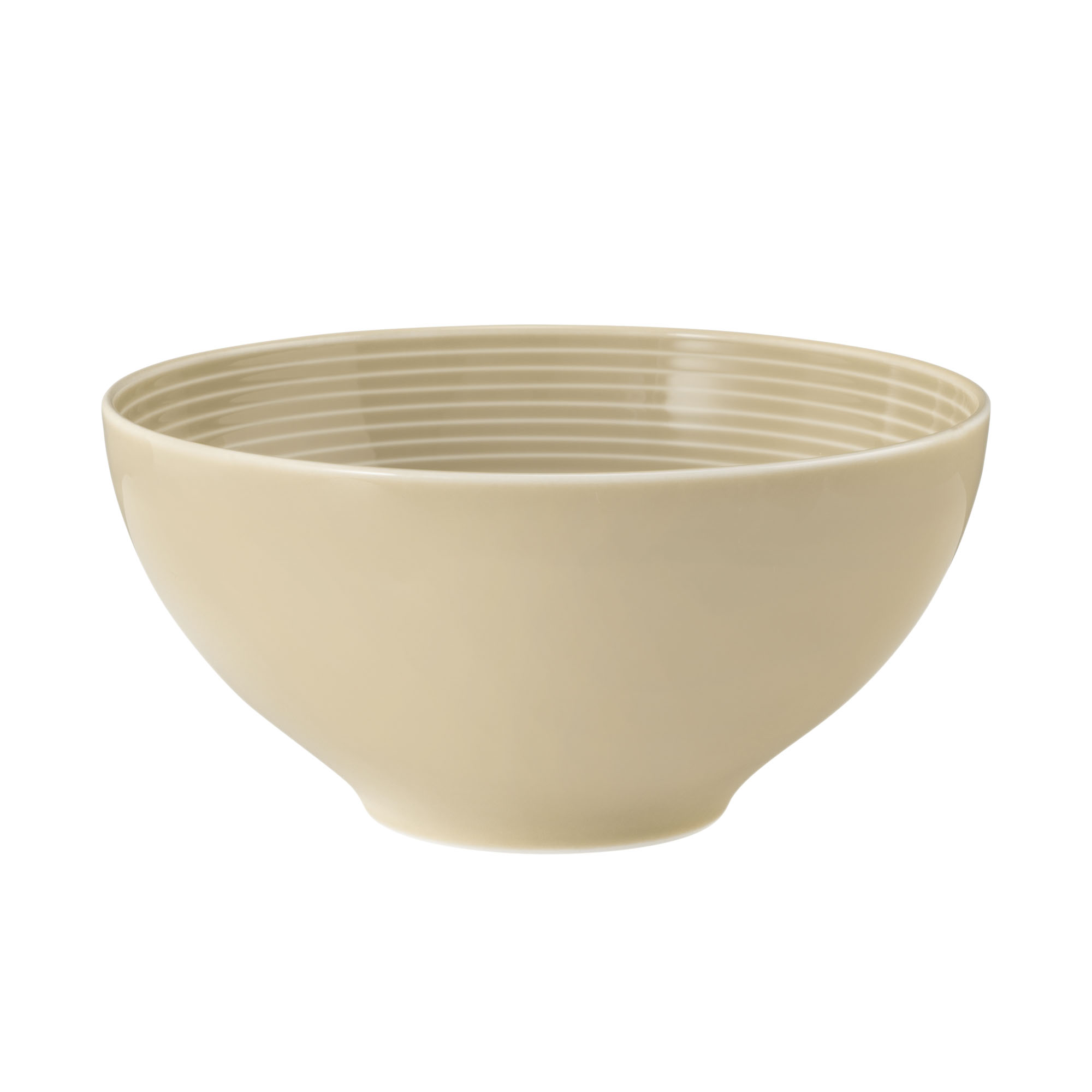 Schale in Sandbeige; Seitenansicht. Sichtbare Gestaltung: rund, tief und innen geriffelt.