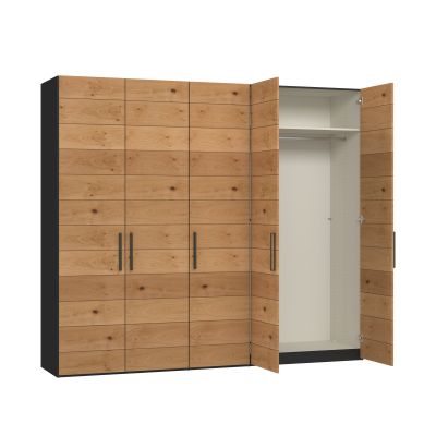 Drehtürenschrank mit teilweise geöffneten Türen und sichtbarem Innenraum