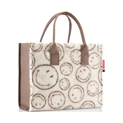 Shopper von Reisenthel, Modell Daily Shopper, in Creme und Braun mit Smiley-Muster aus Teddyfleece, frontal mit zwei kurzen Tragegriffen