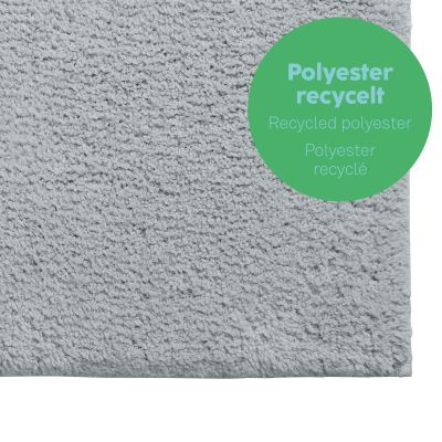 Strukturaufnahme der grauen Maja-Matte; ein grüner Kreis kennzeichnet das Material als recyceltes Polyester.