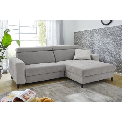 Modernes Ecksofa in Hellgrau mit Ottomane und Kissen in stilvoll