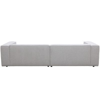 Gerade Rückansicht des ca. 300 x 188 cm großen Ecksofas in Weiß. Die durchgehend gepolsterte Rückseite und die seitlichen Armlehnen sind deutlich zu sehen.