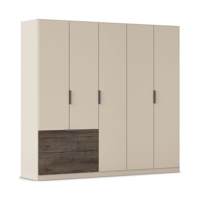 Drehtürenschrank in Champagner mit Absatz in Oak Dunkel, in Schrägansicht dargestellt.
