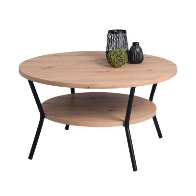 Runder Couchtisch mit heller Holzplatte und schwarzem Metallgestell, dekoriert mit schwarzen Vasen und einer grünen Dekokugel