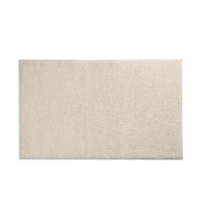 Sandbeige Badematte Maja in rechteckiger Form mit dichter, fein strukturierter Oberfläche.