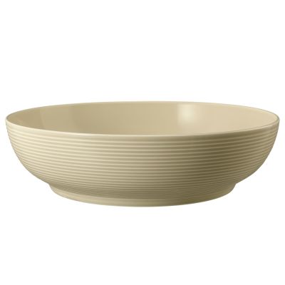 Schale in Sandbeige. Darstellung: Seitenansicht. Merkmale: rund und mitteltief mit waagerechten Rillen.
