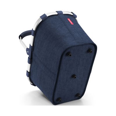 Einkaufskorb von Reisenthel, Modell Carrybag, in Dunkelblau mit melierter Struktur, schräg von unten mit vier schwarzen Standfüßen.