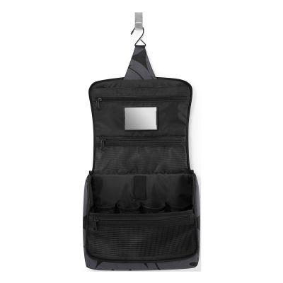 Kulturbeutel von Reisenthel, Modell Toiletbag XL, in Grau mit großflächigem Smiley-Muster, geöffnet und aufgehängt mit Spiegel und mehreren Innenfächern.