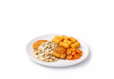 Putenschnitzel mit Karotten, Kroketten und Champignonsauce