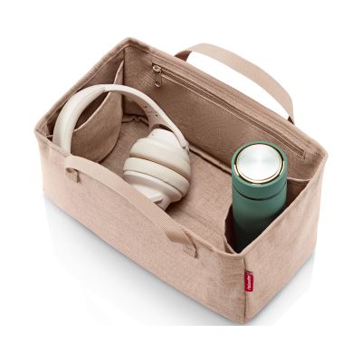 Beige Reisenthel Aufbewahrungskorb mit Kopfhörern und Trinkflasche