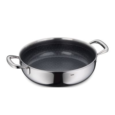 Runde schwarze Servierpfanne mit zwei seitlichen Metallgriffen auf hellem Hintergrund