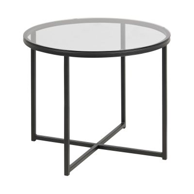 Runder Ecktisch mit Glasplatte im rauchigen Effekt und mattschwarzem Metallgestell, schräg von vorn aufgenommen.