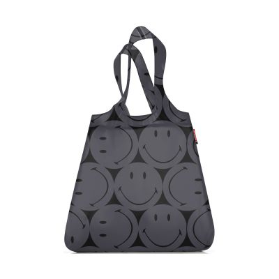 Faltbare Einkaufstasche von Reisenthel, Modell Mini Maxi Shopper, in Grau mit großflächigem Smiley-Muster, vollständig aufgefaltet mit zwei Tragegriffen.