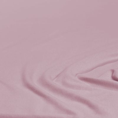 Nahaufnahme des Stoffes in Mauve mit leichten Falten; Farbe und Oberflächenstruktur des Produkts sind erkennbar; Größe 100 x 200 x 30 cm.