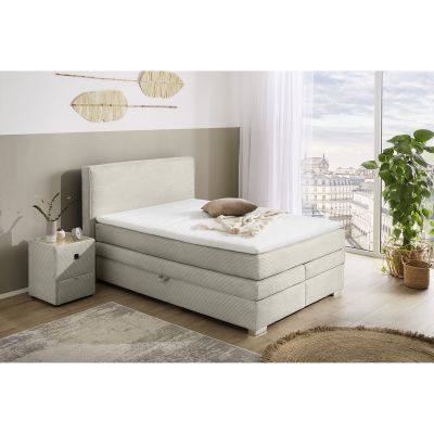 Boxspringbett mit Liegefläche 140×200 cm in Light Greige, dargestellt in einem Milieubild in einem Schlafzimmer