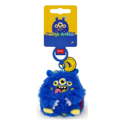 Blauer Monster-Plüsch-Schlüsselanhänger, an der Vorderseite der Kartonaufhängung gezeigt.