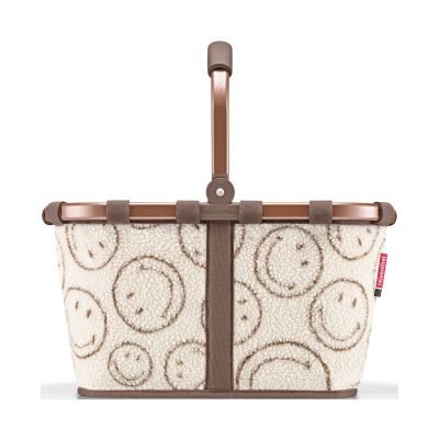 Einkaufskorb von Reisenthel, Modell Carrybag, in Creme und Braun mit Smiley-Muster aus Teddyfleece, von hinten mit hochgestelltem Tragegriff