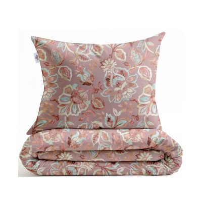 Bettwäsche Franca in Pink, 135 x 200 cm: zusammengefaltete Garnitur mit sichtbarem Kissenbezug mit ornamentalem Blumenmuster in Rosa-, Rot-, Beige- und Türkistönen.