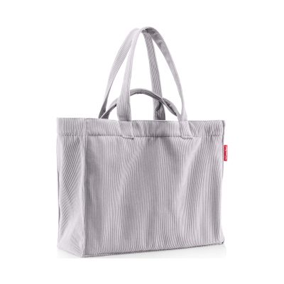 Graue Reisenthel Shopper Tasche aus weichem Cordstoff mit langen und kurzen Tragegriffen auf hellem Hintergrund