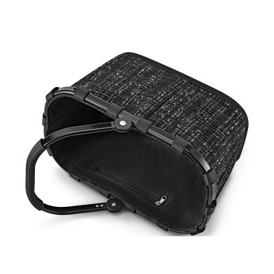Kleiner Einkaufskorb von Reisenthel, Modell Carrybag XS, in Schwarz mit Bouclé-Struktur, seitlich zusammengeklappt dargestellt