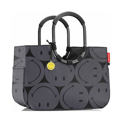 Großer Shopper von Reisenthel, Modell Loopshopper L, in Grau mit großflächigem Smiley-Muster, frontal mit zwei Ringgriffen und gelbem Smiley-Anhänger.
